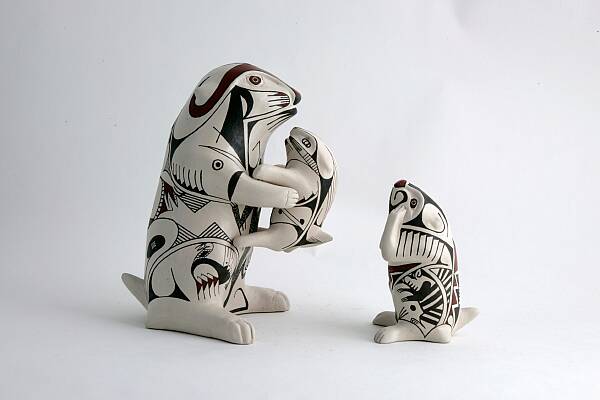 Artist:                          Tomas Quintano\nHeight:                        7  3/4"\nTail to Nose:               9"\nWidth:                         5  3/8"\nPrice:                           $600\n\nThis is a three piece prairie dog set comprised\nof a mother and two babies.  The dimensions\nshown are for the mother prairie dog.